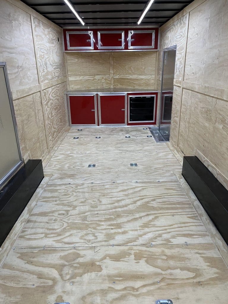 Enclosed Car Hauler 2026 24ft. Econo-Max 7k Axles, 8ft. Interior, Alum Wheels, Rear Wing, Toolbox & Cabinets 9255