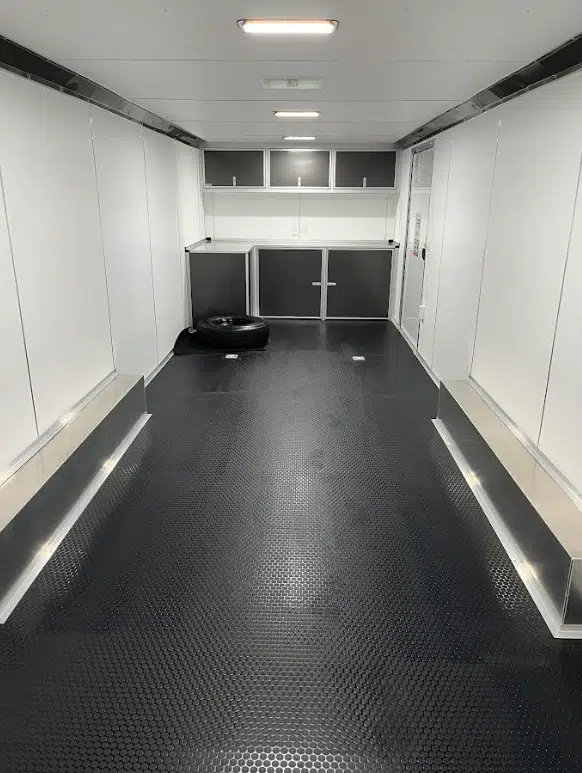 Enclosed Car Hauler 2026 28ft. Aluminum Extreme w/6K Torsion Spread Axles, Finished Interior w/Cabinets & Alum. Wheels 0594